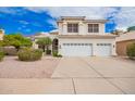 Charming two-story home with a three-car garage and well-maintained landscaping at 5332 W Linda Ln, Chandler, AZ 85226