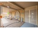 Charming patio featuring brick flooring, shaded seating area, and views of the outdoor space at 3224 W Ironwood Dr, Phoenix, AZ 85051