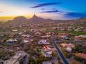 Expansive aerial view of luxury neighborhood showcasing desert landscape and mountain views at 10707 E Cottontail Ln, Scottsdale, AZ 85255