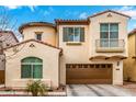 Charming two-story home features a brown two-car garage, stucco facade, and a delightful wrought-iron balcony at 1548 W Windhaven Ave, Gilbert, AZ 85233