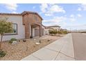 Attractive single-Gathering home boasting a stone facade and an attached two-car garage at 24275 N 173Rd Ave, Surprise, AZ 85387