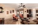 Comfortable living room featuring tile floors, neutral paint, and an open layout at 19932 N Ibis Way, Maricopa, AZ 85138