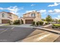 Lovely exterior view of a home featuring desert landscaping, large driveway and a tile roof at 2395 W Riverside St, Chandler, AZ 85248