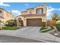 Charming two-story home with a beautiful tile roof, manicured landscaping and two car garage at 2395 W Riverside St, Chandler, AZ 85248