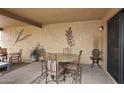 Outdoor patio with table and chairs, perfect for entertaining or relaxing at 416 Leisure World --, Mesa, AZ 85206