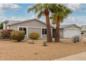 Charming single-story home featuring desert landscaping and a two-car garage at 4739 W Paradise Ln, Glendale, AZ 85306