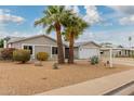 Charming single-story home featuring desert landscaping and a two-car garage at 4739 W Paradise Ln, Glendale, AZ 85306