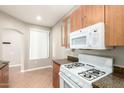 Well-lit kitchen featuring stainless steel appliances, modern cabinets, and an eat-in area at 6900 E Princess Dr # 2124, Phoenix, AZ 85054