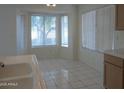 Cozy breakfast nook with bay window, providing ample sunlight and views at 12046 S 44Th St, Phoenix, AZ 85044