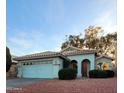 Charming single-story home with a well-maintained front yard and a two-car garage at 12046 S 44Th St, Phoenix, AZ 85044