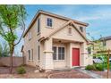 Attractive two-story house with a red front door and low-maintenance landscaping at 4129 W Park St, Phoenix, AZ 85041