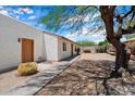 Spacious backyard with desert landscaping, perfect for relaxation and outdoor activities at 1510 E Wescott Dr, Phoenix, AZ 85024