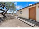 Side yard view of the property, featuring desert landscaping, and a block wall at 1510 E Wescott Dr, Phoenix, AZ 85024