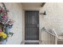 Charming front door with security screen and the number 101 above it at 16624 E Palisades Blvd # 101, Fountain Hills, AZ 85268