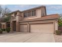 Two-story home featuring a two-car garage and a rock front yard at 1805 E Sagebrush St, Gilbert, AZ 85296