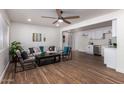 Open concept living room featuring hardwood floors, recessed lighting, and contemporary furnishings at 1900 S Coconino Dr, Apache Junction, AZ 85120