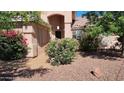 Close-up of the home's entrance showcasing desert landscaping at 20630 N 42Nd Ave, Glendale, AZ 85308