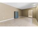 Inviting living area showcasing tile floors and a painted blue hutch at 2348 W Laurel Ln, Phoenix, AZ 85029