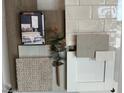 Neutral home design selections featuring flooring, bedroom, and bathroom samples at 25156 W Wayland Dr, Buckeye, AZ 85326