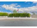 Street view of a home featuring a well-manicured front yard, with green hedges along the property line at 4113 N 10Th Pl, Phoenix, AZ 85014