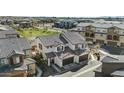 Stunning aerial view of a two-story home, showcasing its tile roof and well-maintained landscaping at 1255 N Arizona Ave # 1043, Chandler, AZ 85225
