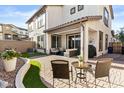 Charming backyard features a paved patio area, seating, and lush green landscaping, perfect for relaxation at 1255 N Arizona Ave # 1043, Chandler, AZ 85225