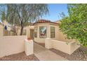 Attractive home exterior featuring a tiled roof, well-placed windows, and desert landscaping at 2167 E Aspen Dr, Tempe, AZ 85282