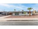 Charming single-story home featuring desert landscaping, a covered parking area, and neutral paint at 3707 W Elm St, Phoenix, AZ 85019