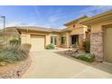 Attractive single-story home featuring desert landscaping, a tile roof, and a one-car garage at 41819 N Anthem Ridge Dr, Phoenix, AZ 85086