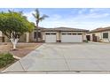 Charming single-story home features a spacious driveway and a convenient two-car garage at 4665 E Dartmouth St, Mesa, AZ 85205