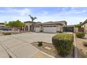 Charming single-story home features a spacious driveway and a convenient two-car garage at 4665 E Dartmouth St, Mesa, AZ 85205
