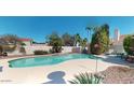 Backyard features a spacious swimming pool and deck area, great for entertaining guests at 6720 W Mcrae Way, Glendale, AZ 85308