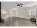 Spacious living room with neutral colors and modern flooring at 44865 W Miraflores St, Maricopa, AZ 85139