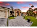 Beautiful single-story home with a three-car garage, stone entryway, and well-kept lawn, perfect for modern living at 5670 W Linda Ln, Chandler, AZ 85226