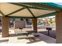 Covered picnic area and park offers a relaxing space for outdoor activities and enjoyment at 240 W Juniper Ave # 1053, Gilbert, AZ 85233