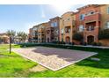 Outdoor sand volleyball court on a sunny day offers great recreational opportunity at 240 W Juniper Ave # 1053, Gilbert, AZ 85233