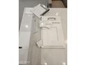 Selection of interior design materials: countertops, cabinets, flooring, and tile samples at 6790 S Springs Pl, Chandler, AZ 85249