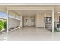 Covered parking area featuring a spacious design and convenient access to the home at 10815 W Hatcher Rd, Sun City, AZ 85351