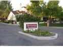 Breckenridge Townhomes community sign surrounded by lush landscaping at 170 E Guadalupe Rd # 154, Gilbert, AZ 85234