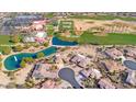 Aerial view showcasing the home's proximity to the golf course, gym, spa, pool, and putting green at 19644 N Majestic Vista Ct, Surprise, AZ 85387