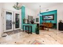 Welcoming front entrance with high ceilings and beautiful tile flooring at 19644 N Majestic Vista Ct, Surprise, AZ 85387