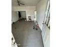 This fixer-upper living room offers abundant square footage and natural light at 3241 W Fillmore St, Phoenix, AZ 85009