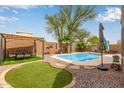 Inviting backyard with a refreshing pool, gazebo, and comfortable seating areas, perfect for relaxation at 4630 E Mountain Vista Dr, Phoenix, AZ 85048
