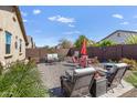 Enjoy outdoor living in this backyard featuring an extended patio, great for gatherings and leisure at 8445 N 61St Ln, Glendale, AZ 85302