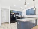 Modern kitchen with stainless steel appliances and ample counter space at 1677 E Heather Dr, San Tan Valley, AZ 85140