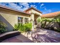 Outdoor patio with desert landscaping and architectural details at 16446 N 59Th St, Scottsdale, AZ 85254