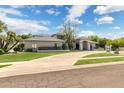 Charming single-story home with a well-maintained lawn, inviting front entrance, and ample curb appeal at 2251 N 32Nd St # 31, Mesa, AZ 85213