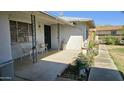 Cozy front porch with chairs and shade to enjoy the outdoors at 4318 N 16Th Ave, Phoenix, AZ 85015