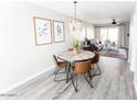 Charming dining area with a round table, comfortable seating, and elegant lighting at 4600 N 68Th St # 368, Scottsdale, AZ 85251