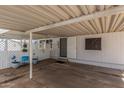 Inviting carport with space for seating enhances the home's curb appeal and outdoor living at 10951 N 91St Ave # 250, Peoria, AZ 85345
